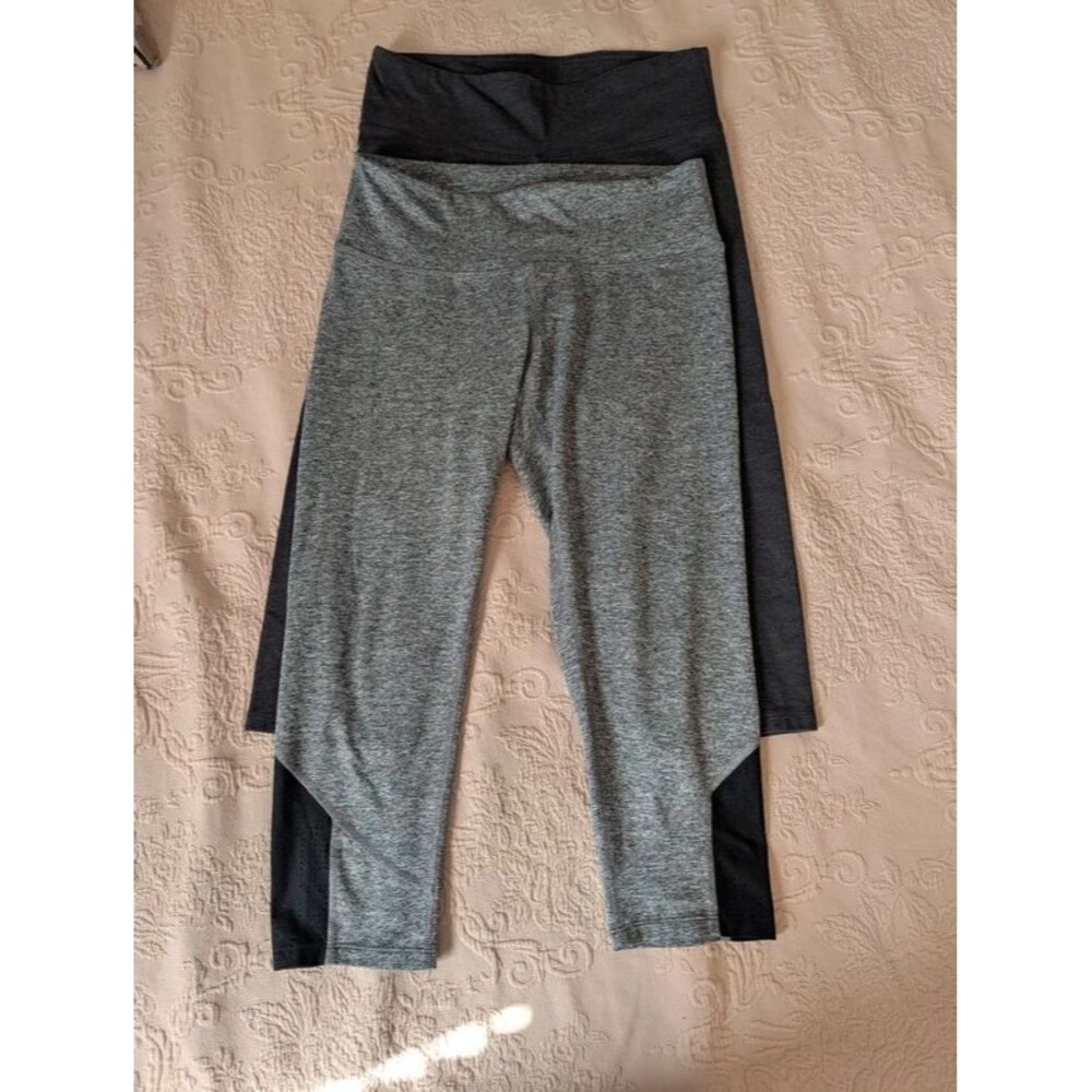 Two pair of champion athletic leggings size Medium
